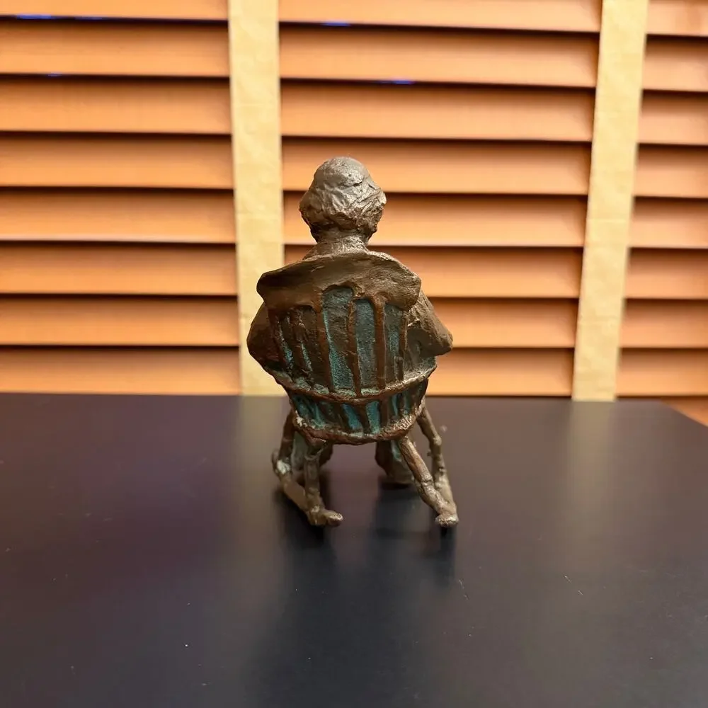 Vintage Heavy Brass Man Reading in Rocking Chair Sculpture